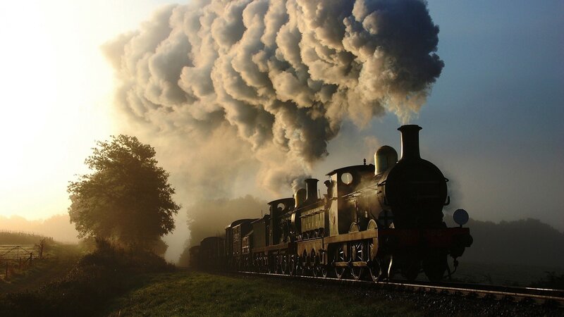 Steam Train on Tracks — Brown, Dramatic, Sunrise