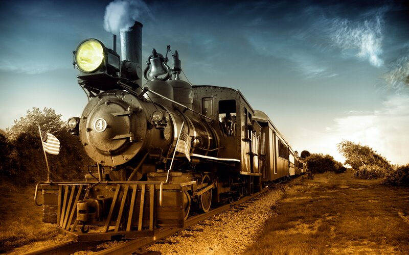 Steam Train on Tracks — Brown, Dramatic, Sunset, Photograph, American Flag