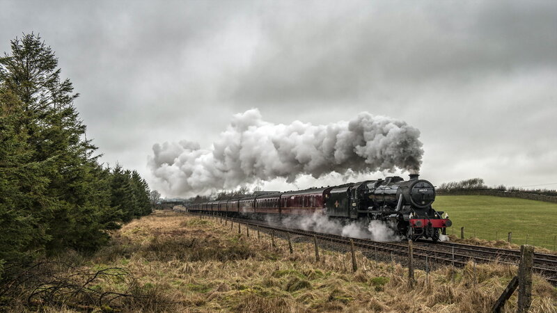 Steam Train on Tracks — Gray, Dramatic, Photograph