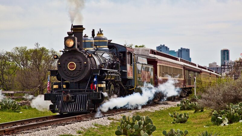 Steam Train on Tracks — Green, Active, Afternoon