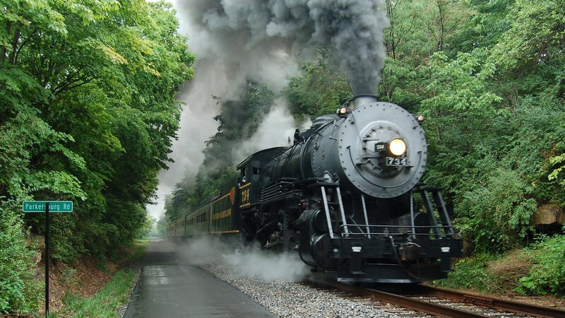Steam Train on Tracks — Green, Dramatic, Afternoon, Photograph, Trees