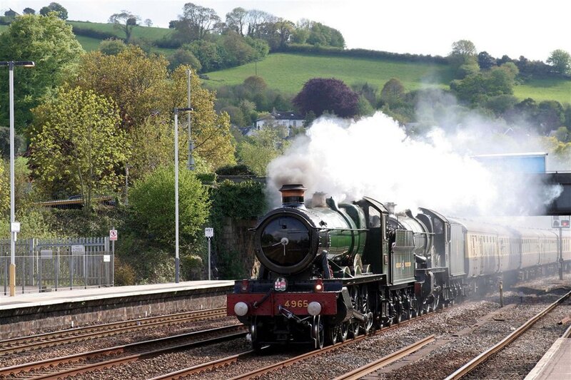 Steam Train on Tracks — Green, Serene, Afternoon