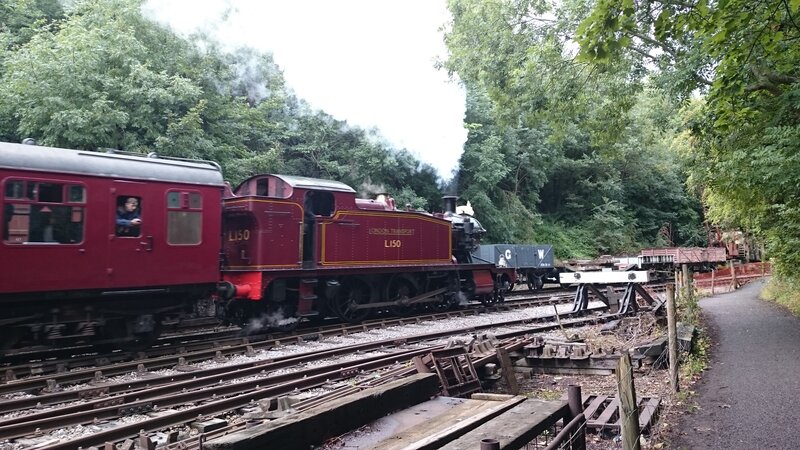 Steam Train on Tracks — Red, Calm, Afternoon