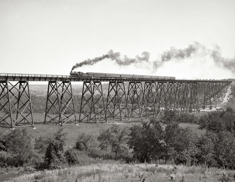 Steam train on trestle bridge
