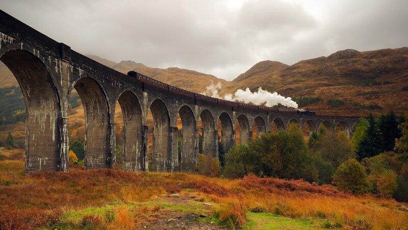 Steam Train on Viaduct — Brown, Dramatic, Autumn