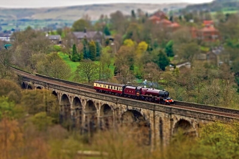 Steam Train on Viaduct — Green, Serene, Autumn
