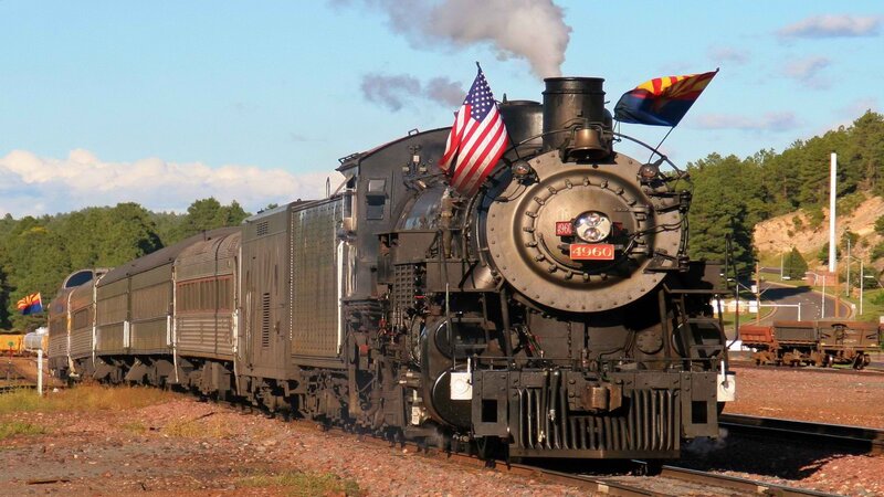 Steam train with flags