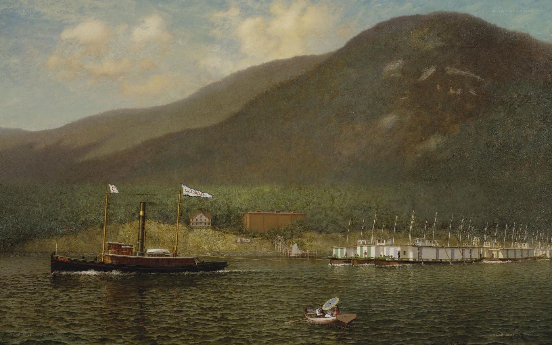 Steamboat on a river with mountains