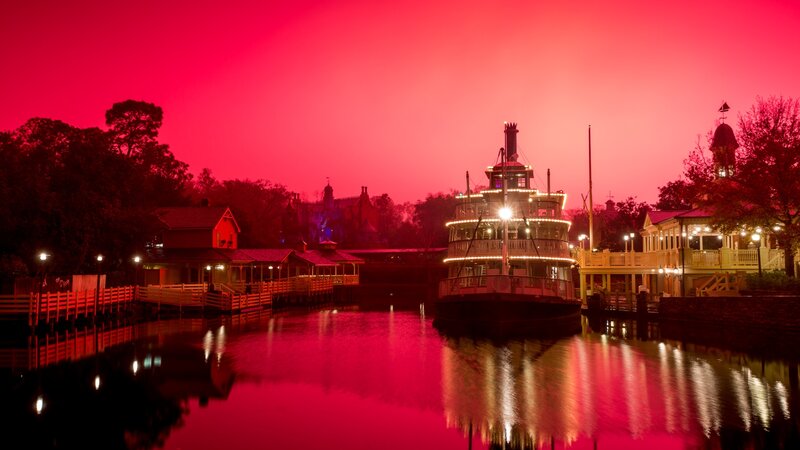 Steamboat on River — Red
