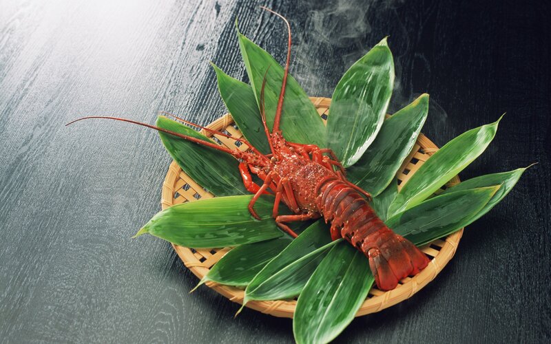 Steamed lobster on bamboo leaves