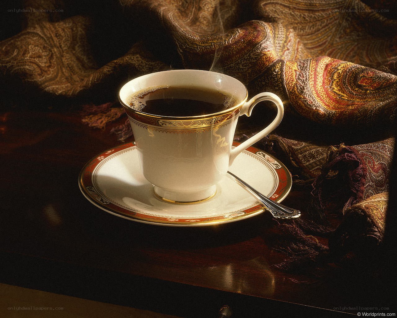 Steaming coffee cup on saucer
