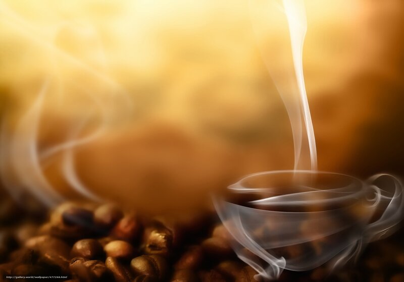 steaming coffee cup with beans