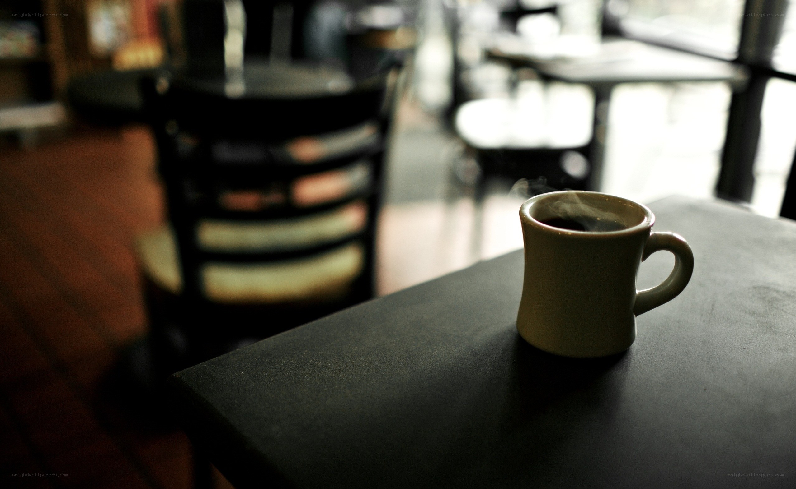 steaming coffee in a cafe