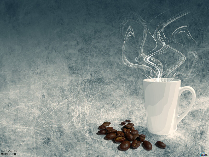 steaming coffee mug with beans