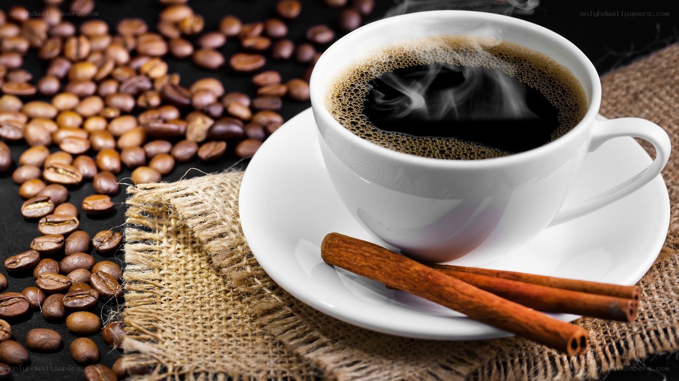 steaming coffee with cinnamon