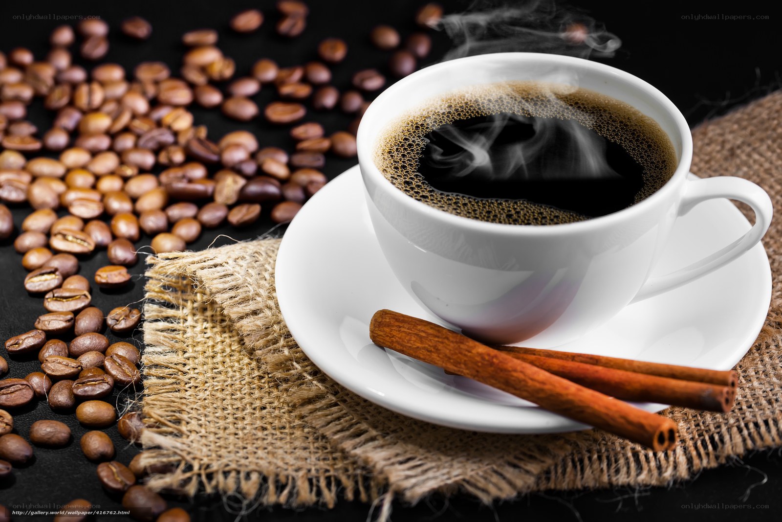 steaming coffee with cinnamon sticks