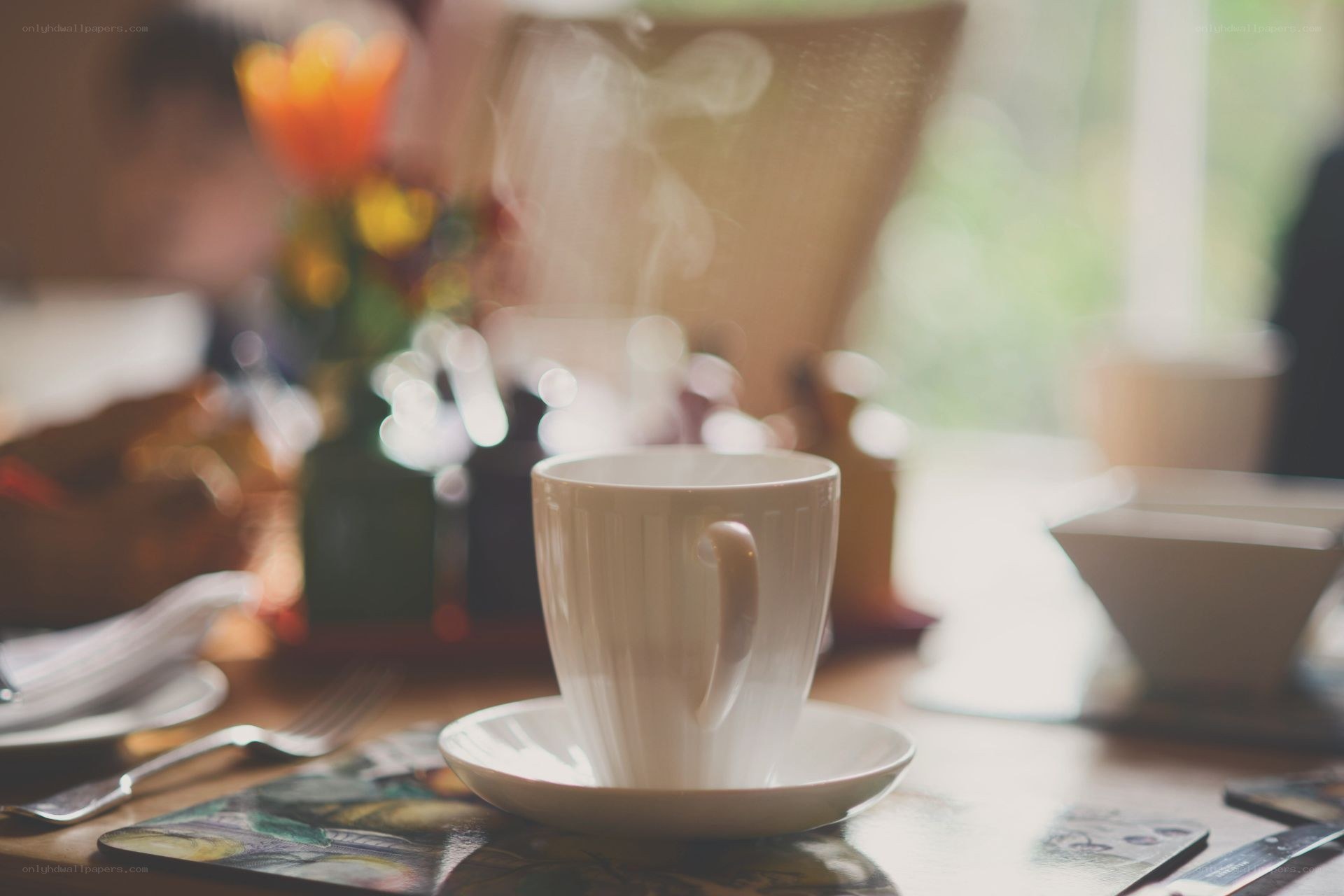 Steaming cup of tea on a table