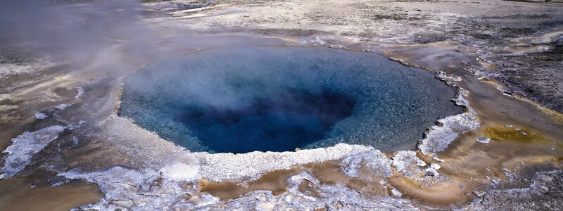 steaming geothermal spring