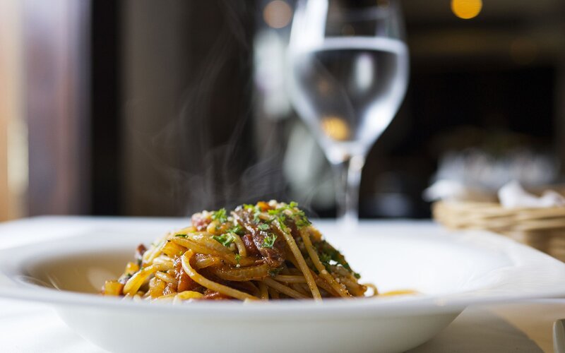 steaming pasta dish