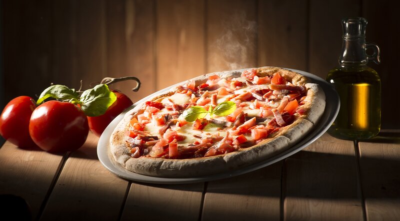 Steaming Pizza on Table