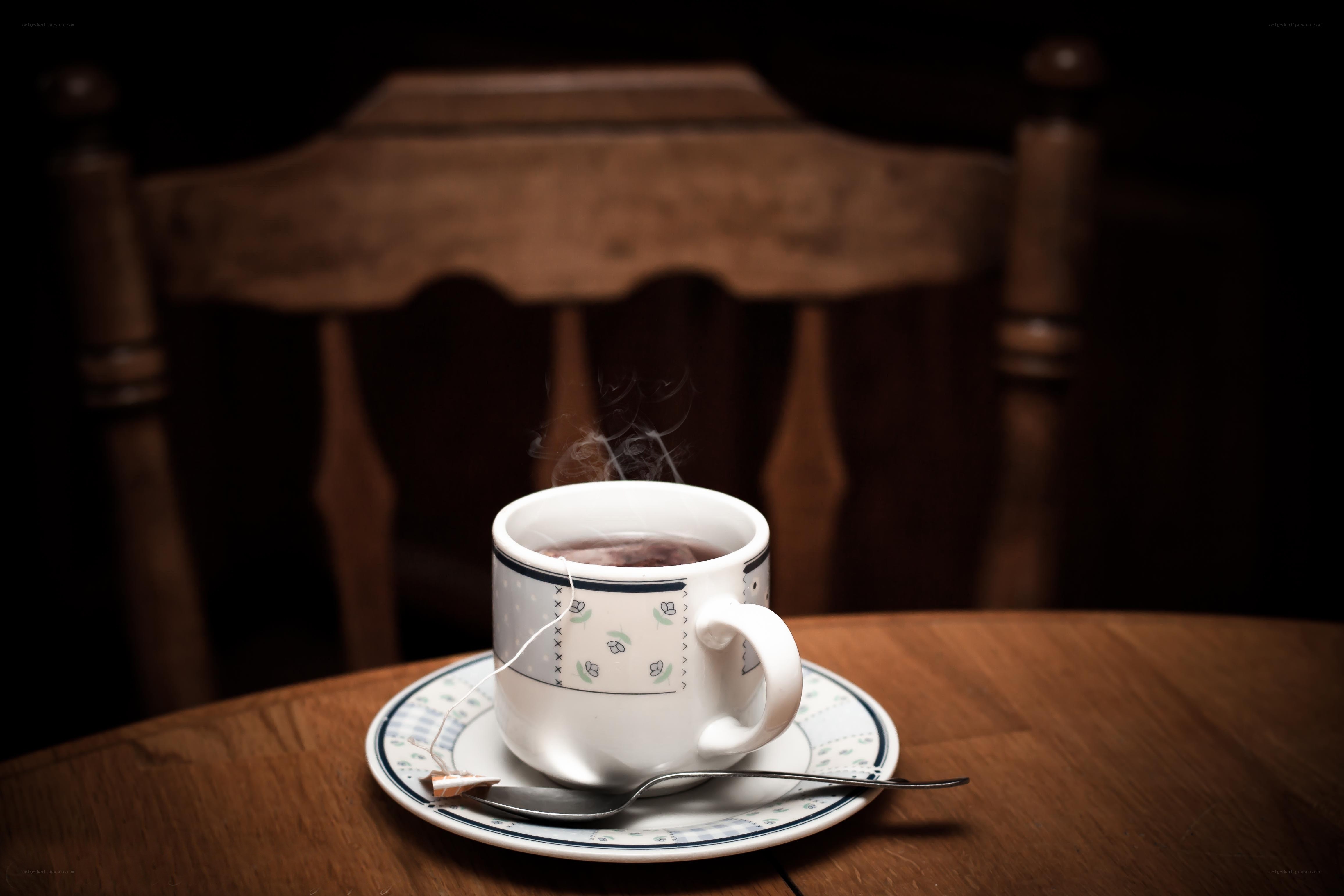 steaming tea cup on table