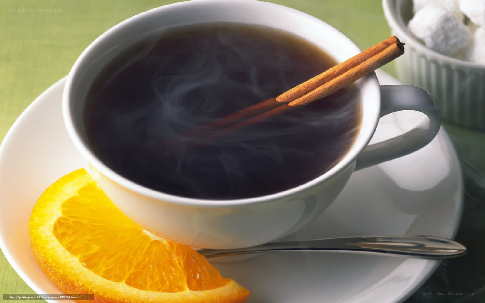 steaming tea with cinnamon and orange