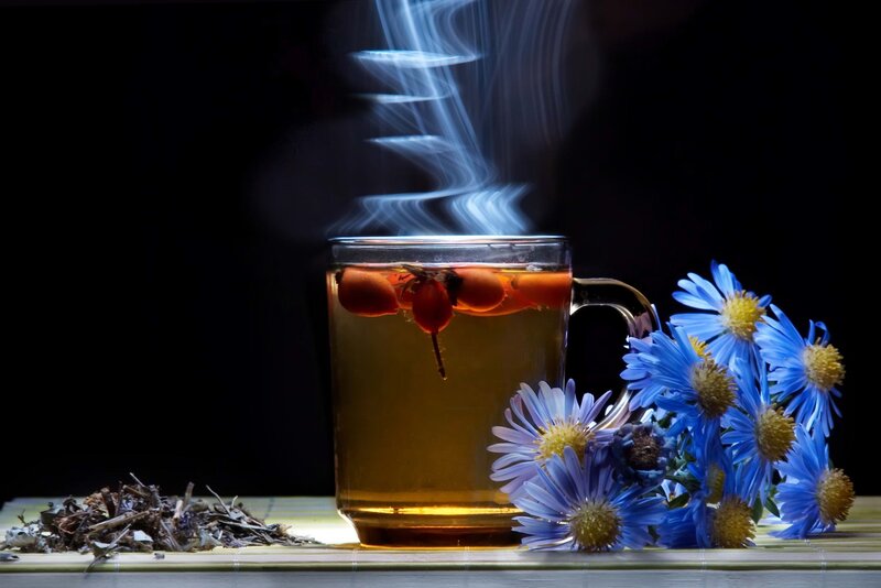 Steaming tea with flowers