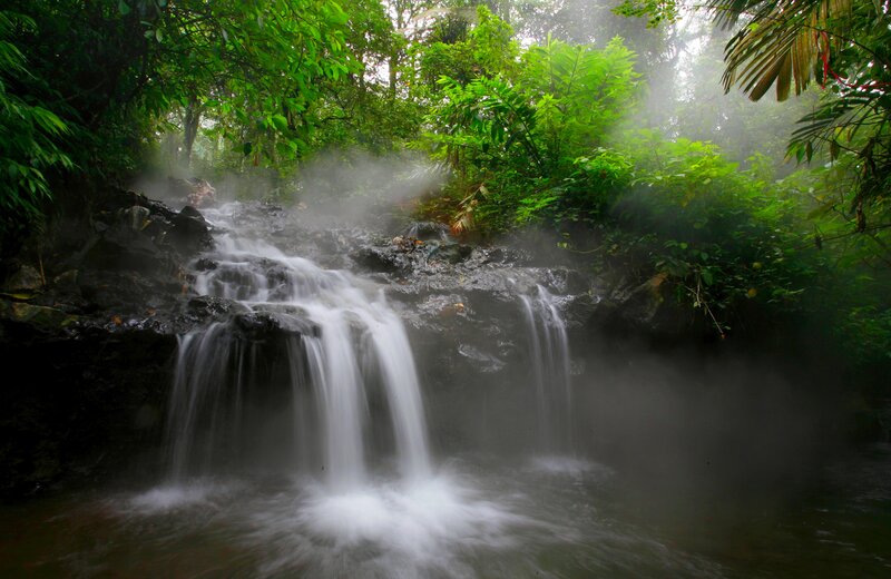 Steaming Waterfall in Forest — Green