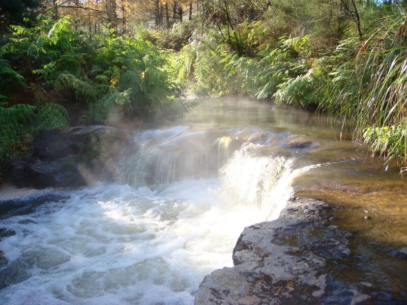 Steaming waterfall in forest