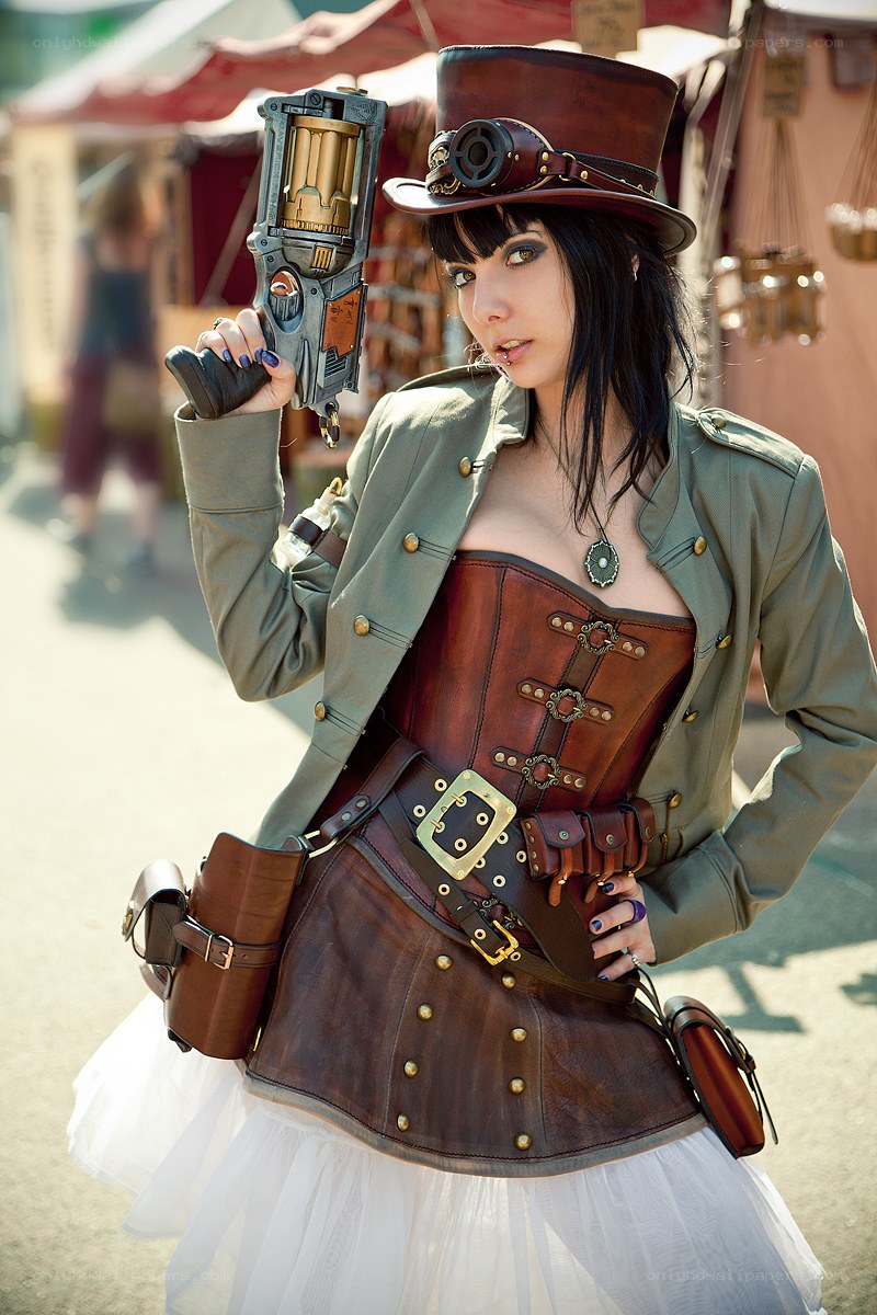 Steampunk cosplayer with gun
