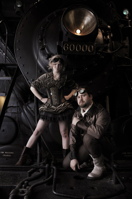 Steampunk couple with train