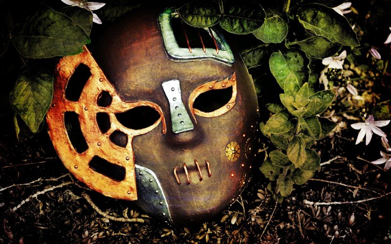 steampunk mask in foliage