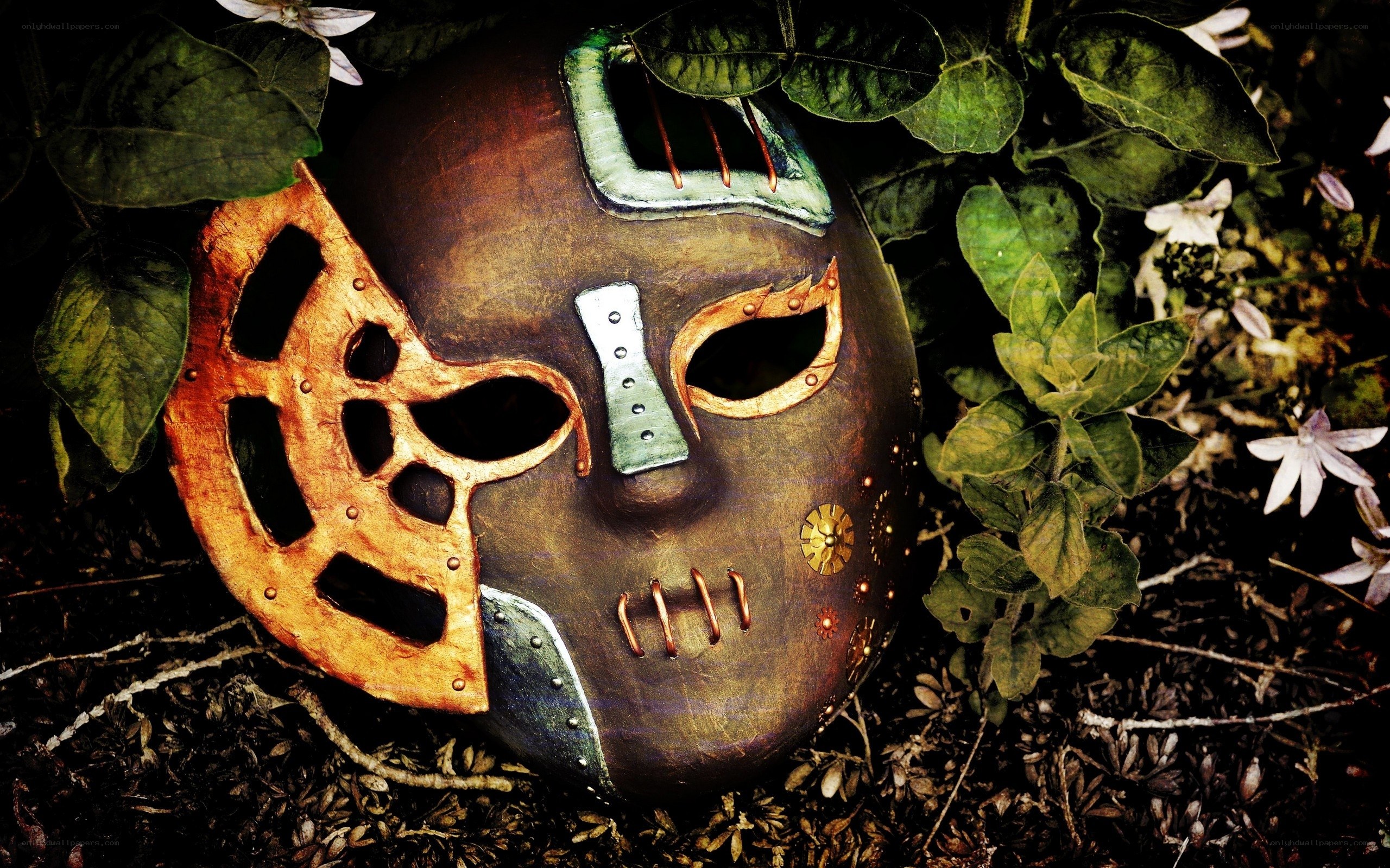 steampunk mask in foliage