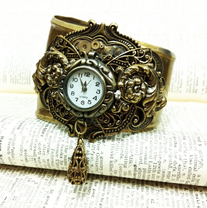 steampunk watch on book