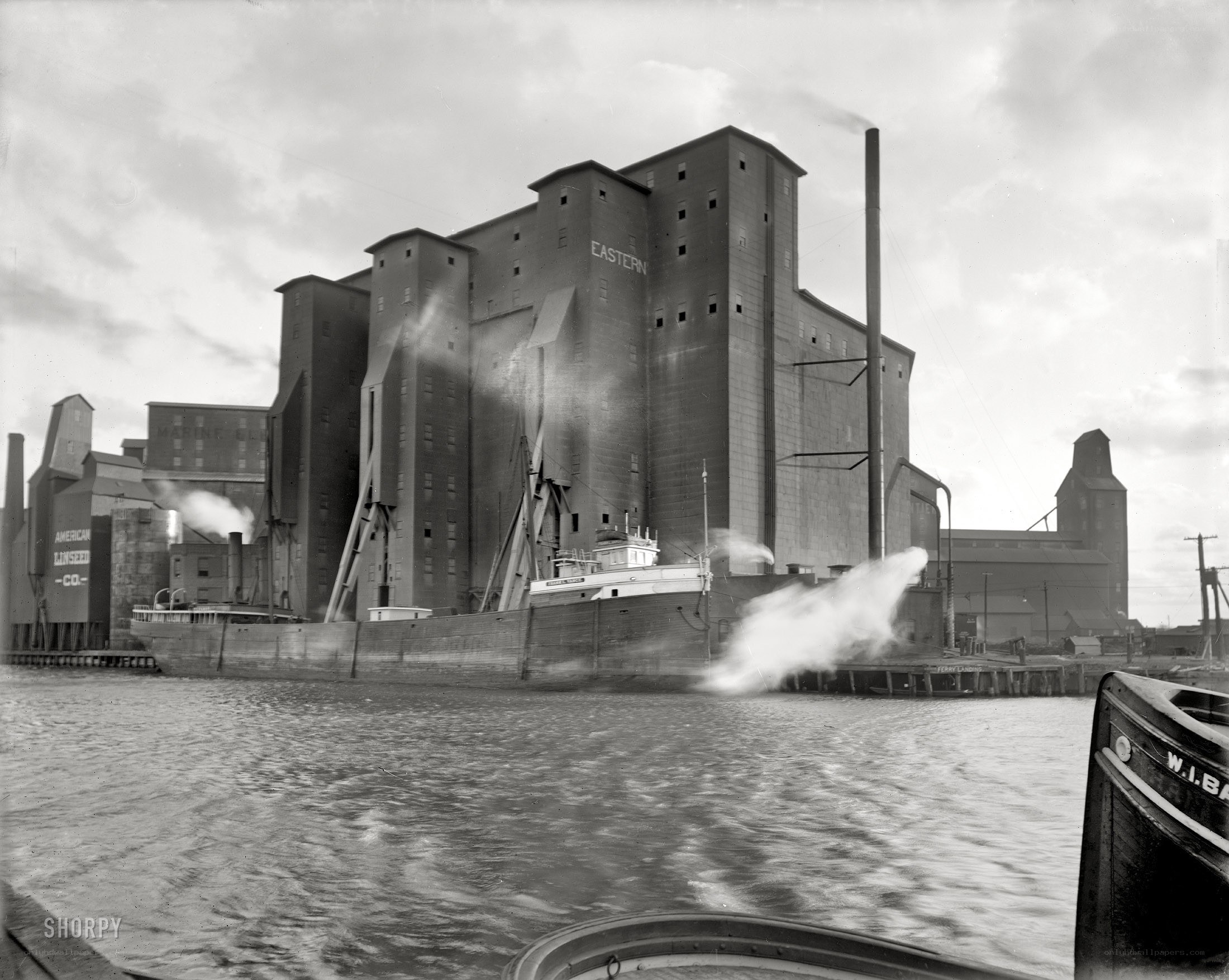 Steamship at grain elevator