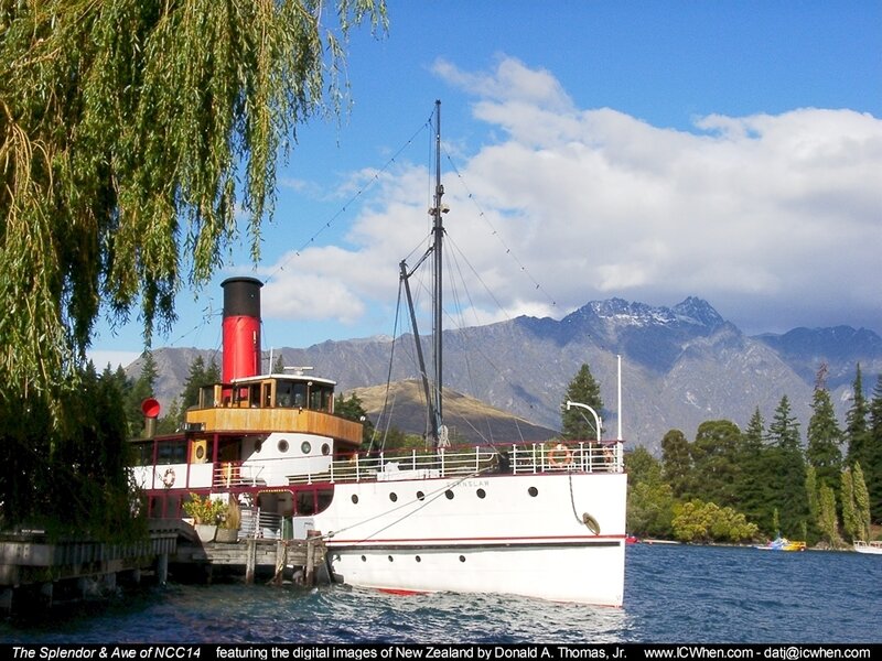 Steamship on a lake with mountains