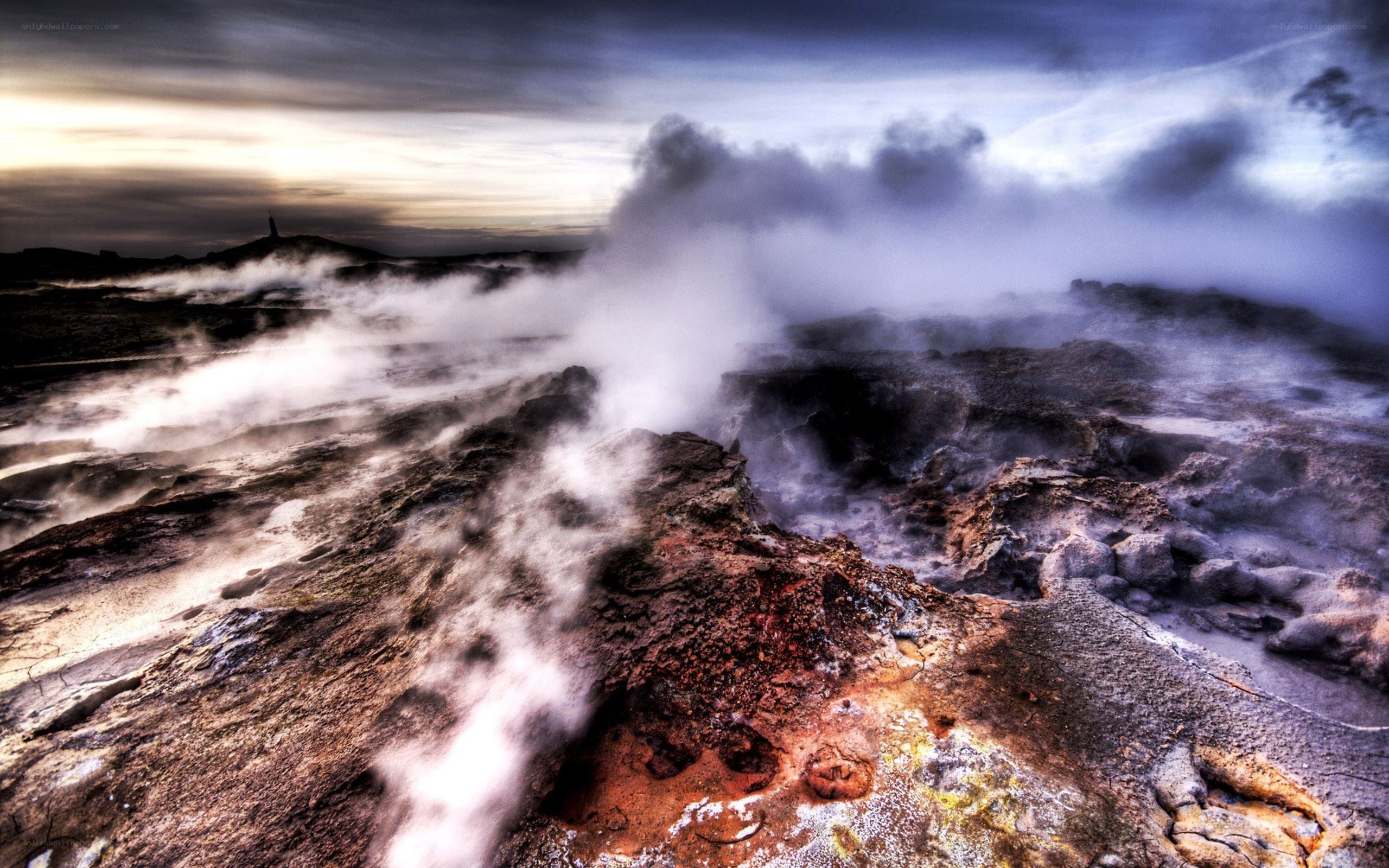Steamy volcanic landscape at dusk