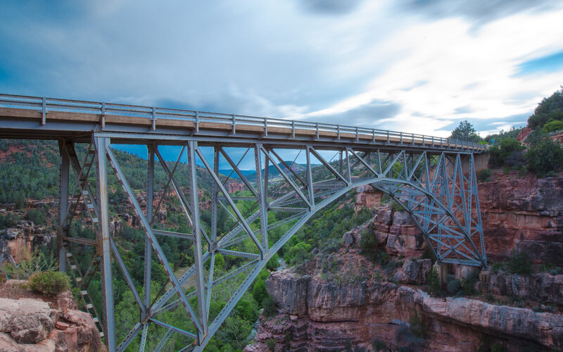 Steel Truss Bridge — Blue, Dramatic, Afternoon