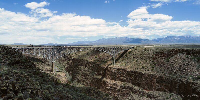 Steel Truss Bridge — Blue, Serene, Afternoon, Photograph, Mountains