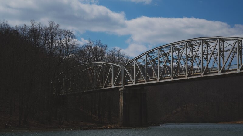 Steel Truss Bridge — Blue, Serene, Autumn