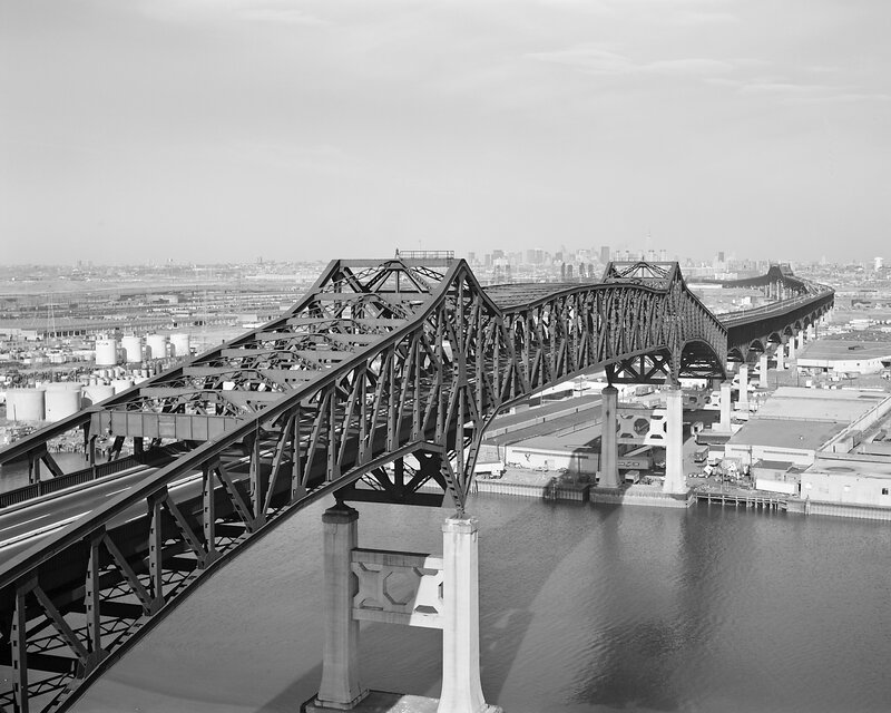 Steel truss bridge over water