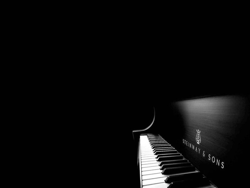 Steinway piano in dark room