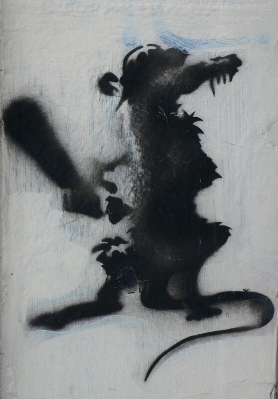 Stenciled rat graffiti art