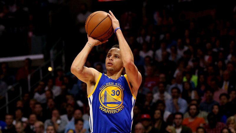 Stephen Curry shooting a three-pointer
