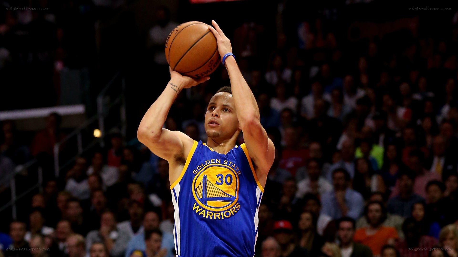 Stephen Curry shooting a three-pointer