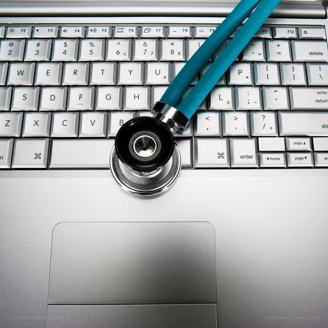 stethoscope on laptop keyboard