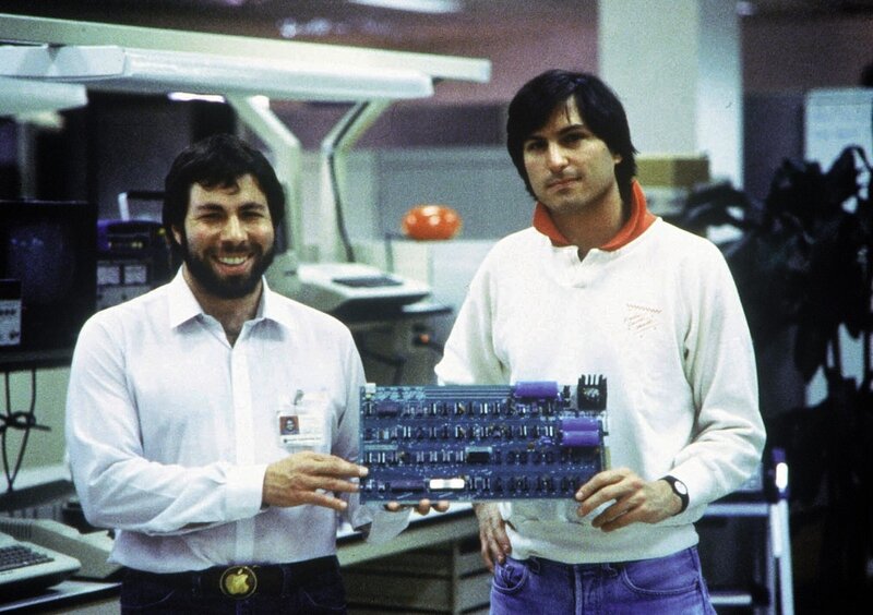 Steve Jobs and Steve Wozniak with Apple I board