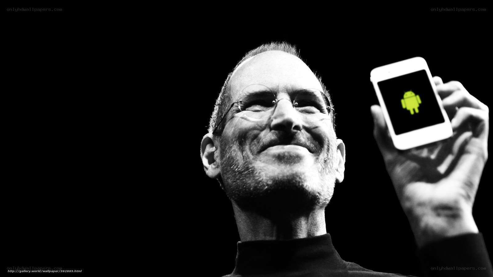 Steve Jobs holding Android phone