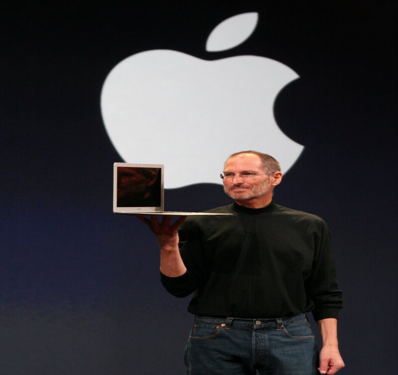 Steve Jobs Holding Laptop — Black