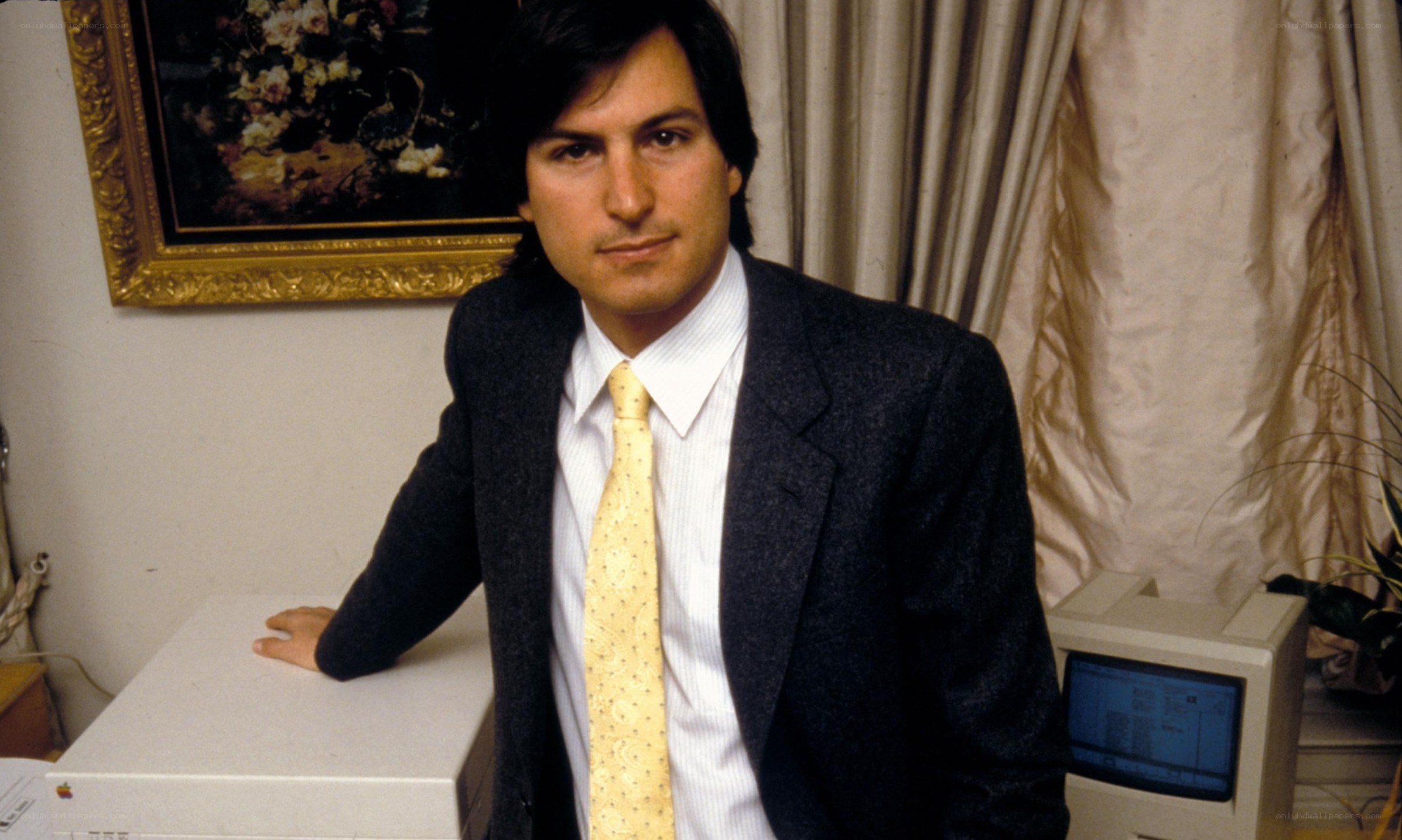 Steve Jobs with early Apple computer
